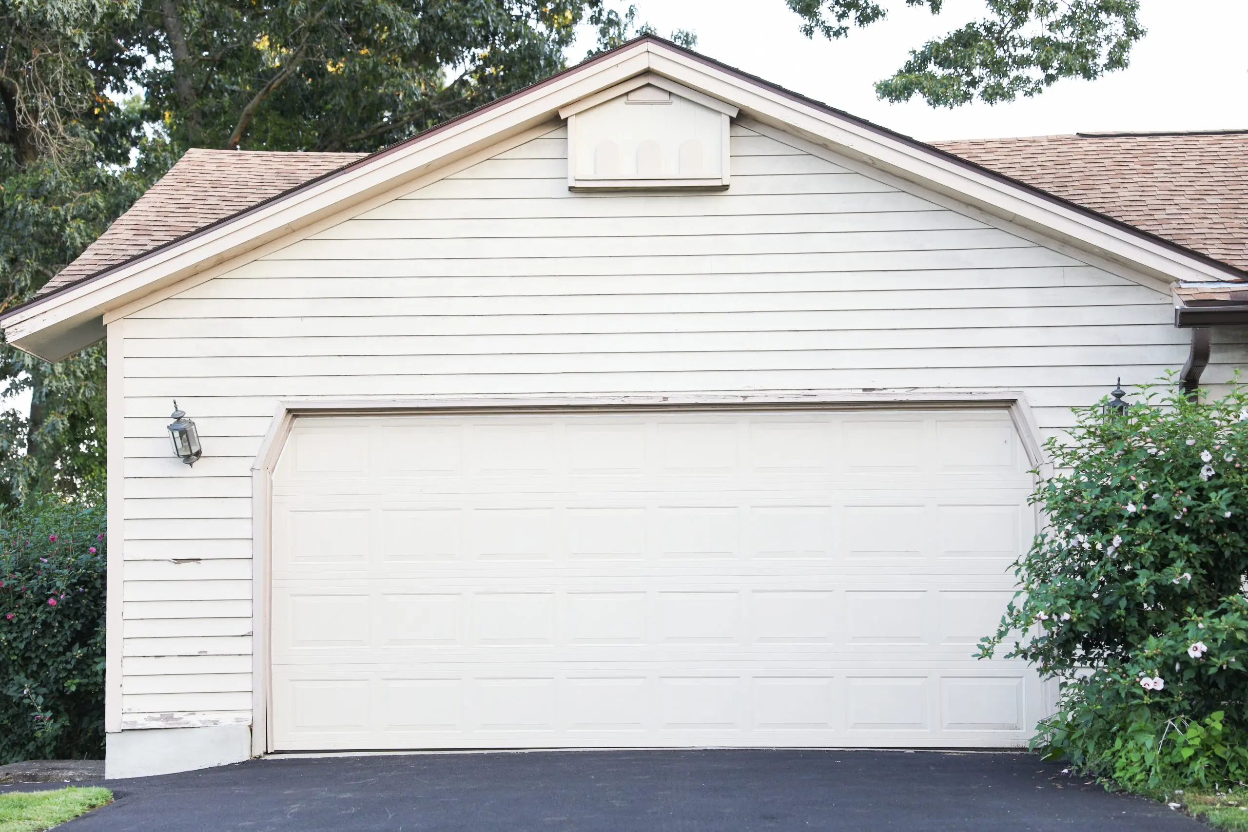 Wide white garage door design, installation services near me